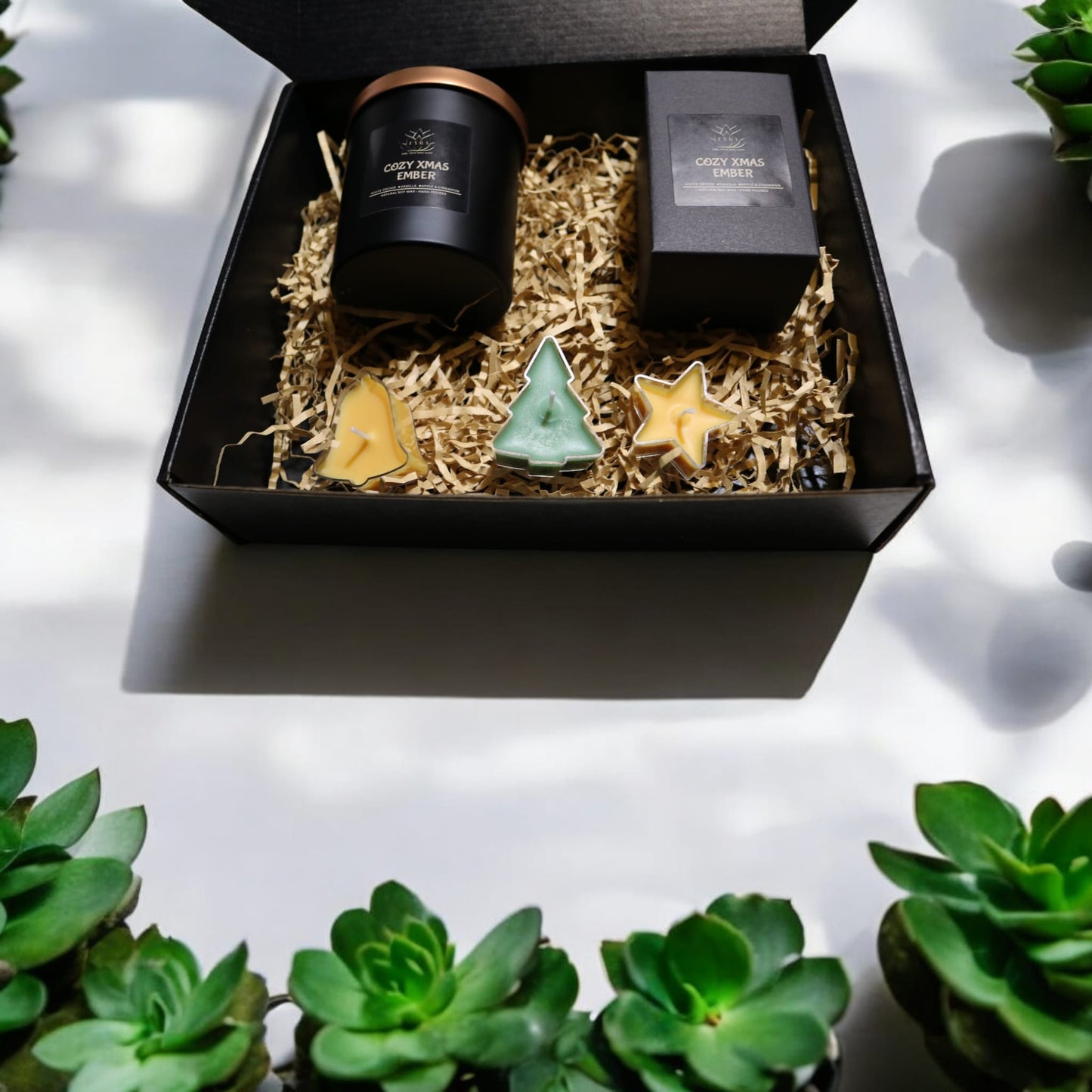 FYRA Christmas Gift Box - Soy Candle. Festive and aromatic, perfect for celebrating the holiday season with a beautifully scented soy candle and other Christmas-themed goodies