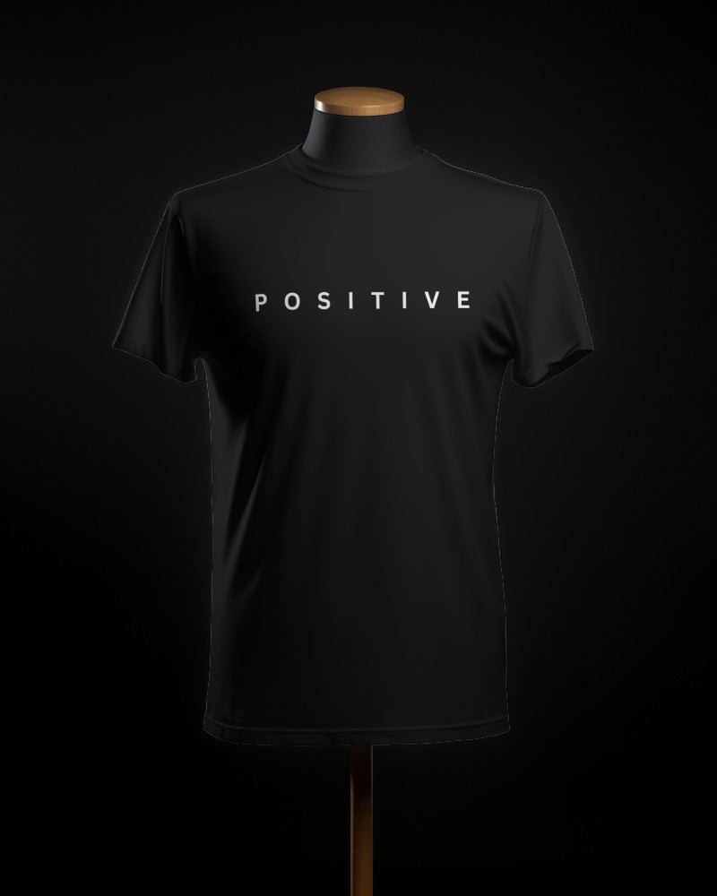 FYRA 'Positive' Front Black Tee. Bold and uplifting, perfect for radiating positivity and good vibes