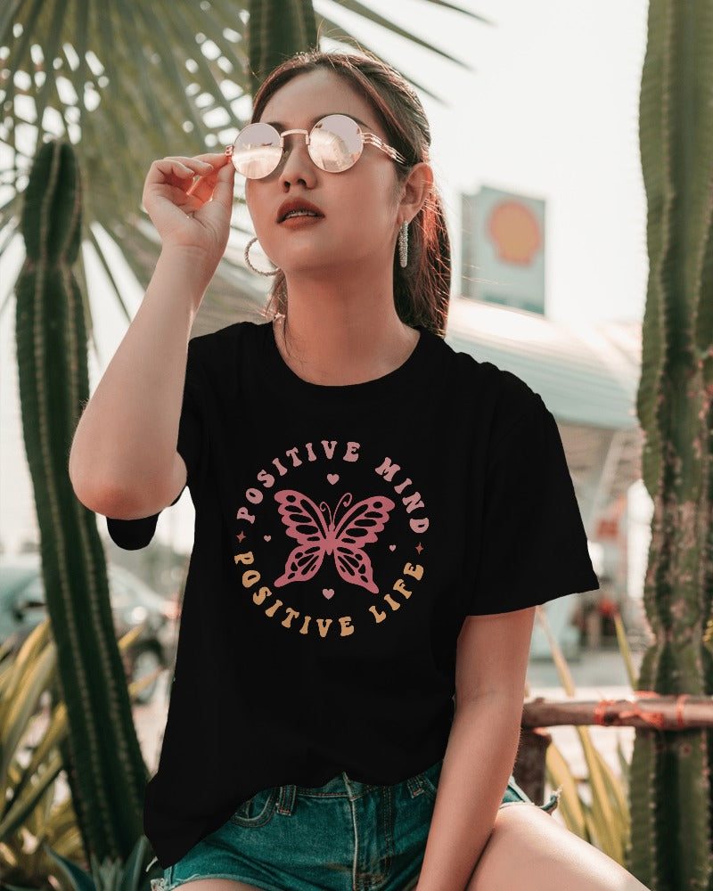 FYRA 'Positive Mind, Positive Life' Front Black Tee. Bold and motivational, perfect for spreading optimism and a positive outlook.