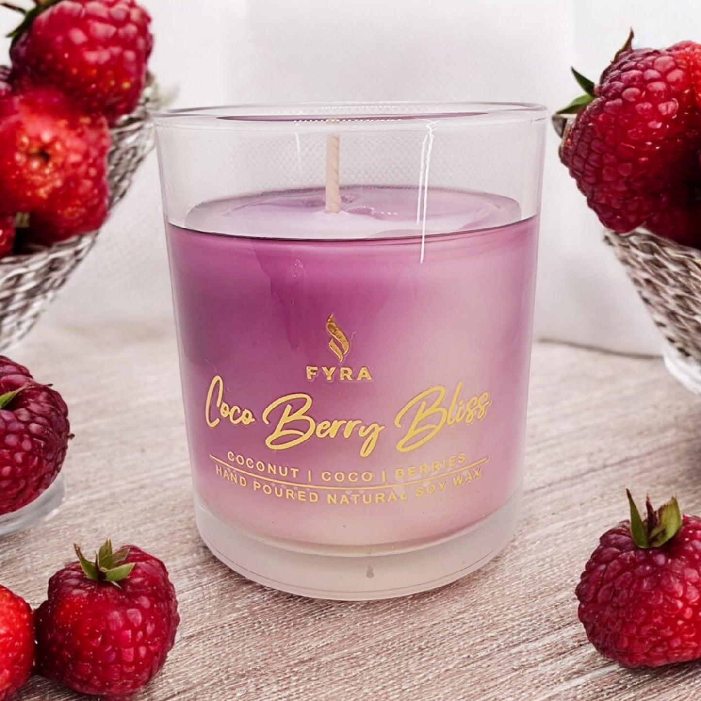 FYRA 'CocoBerry Bliss' Soy Candle. Sweet and soothing, perfect for creating a cozy, fragrant atmosphere with the delightful scent of coconut and berries.