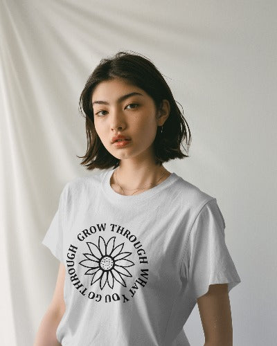FYRA 'Grow Through What You Go Through' Front White Tee. Inspirational and resilient, perfect for embracing personal growth and overcoming challenges
