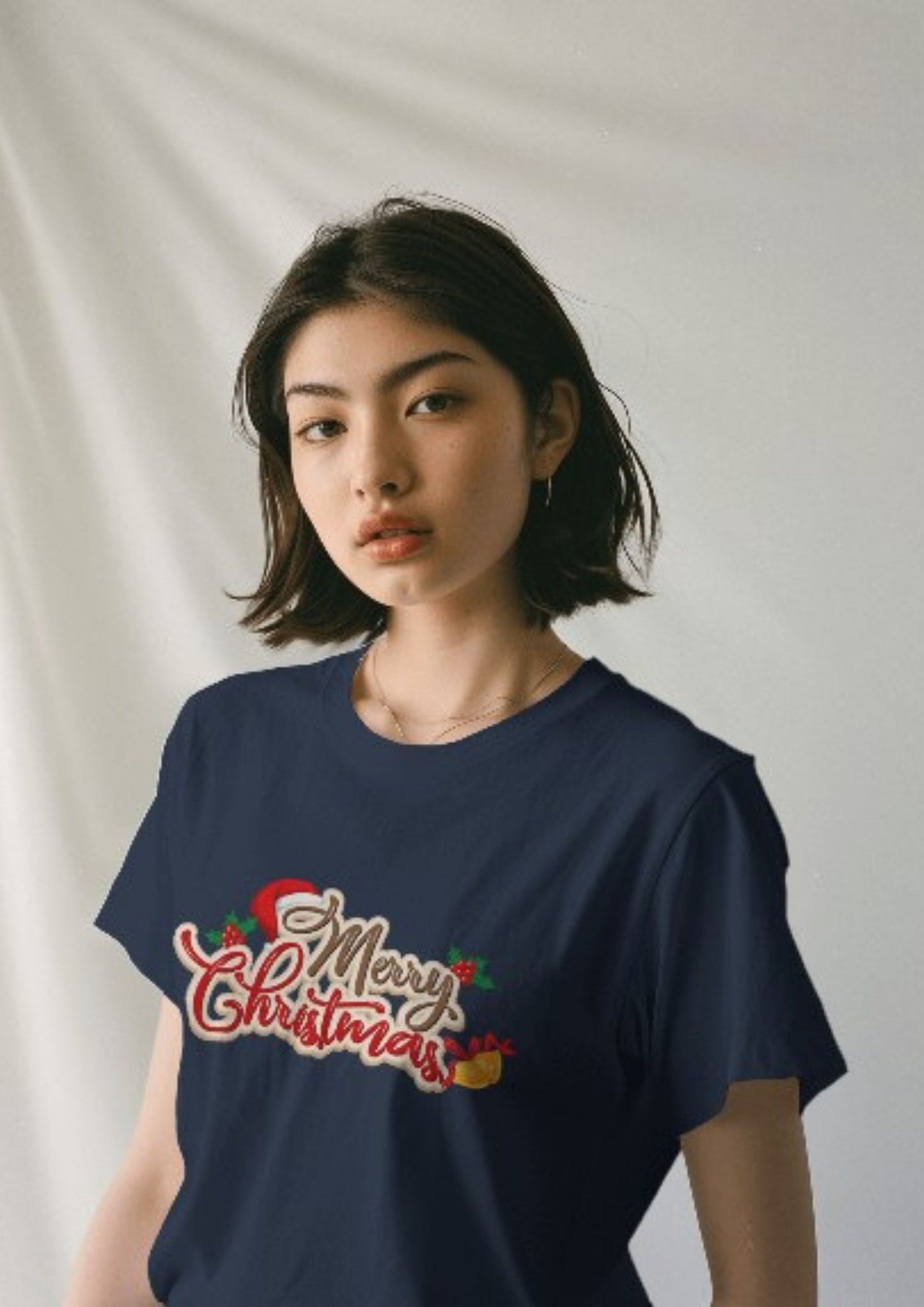 Merry Christmas with Jingle Bells across check on a Navy Classic Crew Tshirt
